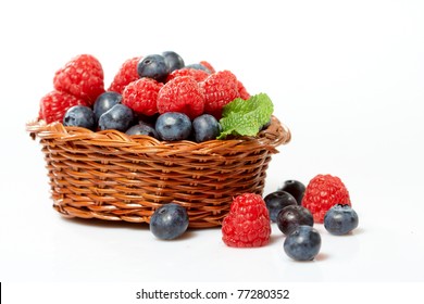 Fresh Berry Fruits In A Wooden Basket