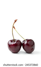 Fresh Black Cherries Isolated On White