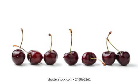 Fresh Black Cherries Isolated On White Background