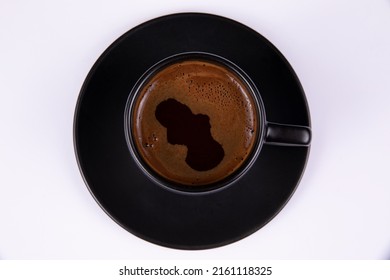 Fresh Black Cofee With Foam On The White Table,