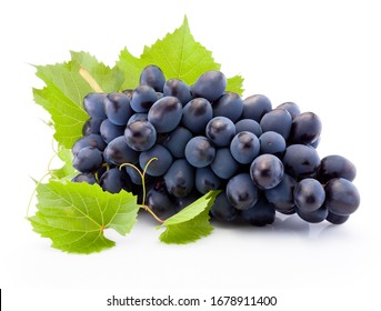 Fresh of blue grapes with leaves isolated on white background