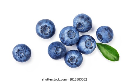 Fresh blueberries with bluberry leaves isolated on white background. Top vew of berries.