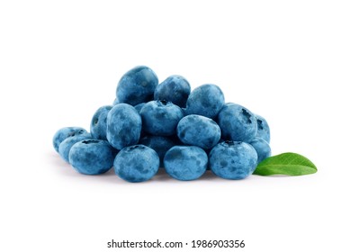 Fresh blueberries with bluberry leaves isolated on white background. - Shutterstock ID 1986903356
