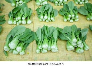 Fresh Bok Choy Or Shanghai Green On The Fabric At Daily Market Of Mae Salong, Tourist Attractions In Chiang Rai, Thailand. Selective Focus.