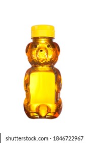 A fresh bottle of natural honey in a bear shaped container isolated on white