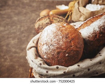 Fresh bread with baking flour and rolling pin