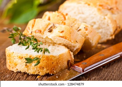 Fresh Bread And Butter On A Wooden Board