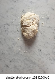 Fresh Bread Dough On A Marble Bench. 