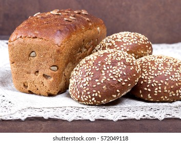 Fresh bread on rustic table.