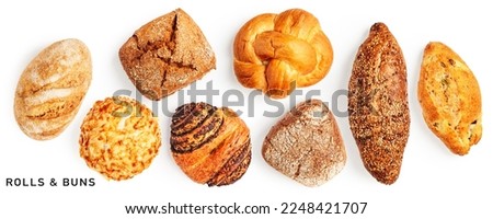 Fresh bread rolls and buns collection and creative layout isolated on white background. Healthy eating and food concept. Flat lay, top view. Design element