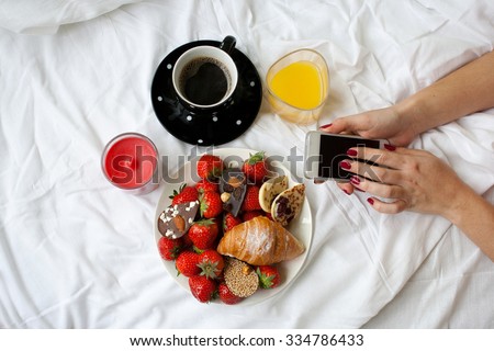 Similar – Hotcakes with fruit and coffee in bed