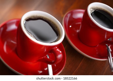 fresh brewed coffee in a red cup