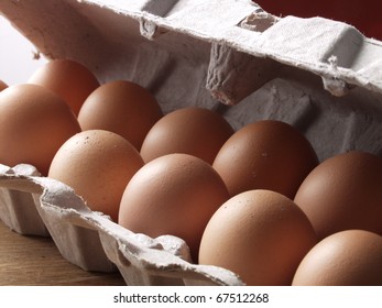 Lot Of  Fresh Brown Eggs. Egg Carton Detail.