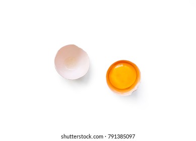 Fresh Brown Organic Chicken Egg Broken With Yolk And Egg White Isolated On White Background. Horizontal Composition. Top View