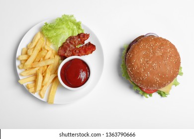 Fresh Burger And Plate With French Fries On White Background, Top View