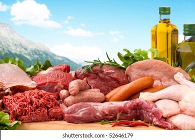 Fresh butcher cut meat assortment garnished with Salad and fresh rosemary - Powered by Shutterstock