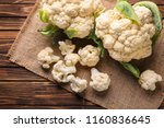 Fresh cauliflower on wooden table