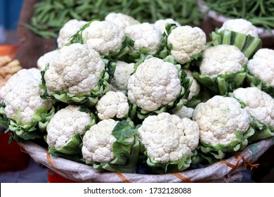 Fresh Cauliflower For Sale In Street Market Delhi, India. Cauliflower Is A Cruciferous Vegetable That Is Naturally High In Fiber And B-vitamins. 