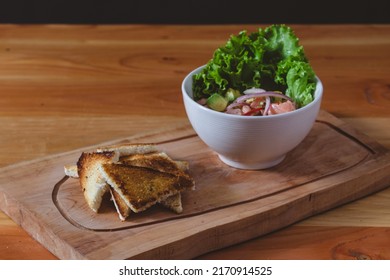 Fresh Ceviche Dish With Toast