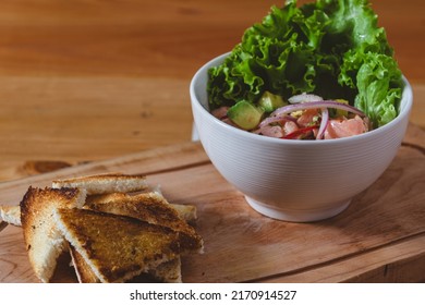 Fresh Ceviche Dish With Toast