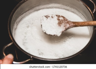 Fresh cheese making process, clotted cheese in a saucepan, homemade cotton, curd cheese or paneer