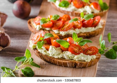 Fresh cheese panini bread with herbs, cherry tomatoes, simple and delicious snack!