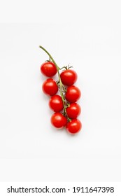 Fresh Cherry Tomatoes On The Vine On White Background. Top View.