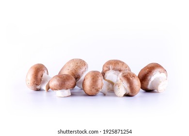 Fresh Chestnut Mushroom On White Surface