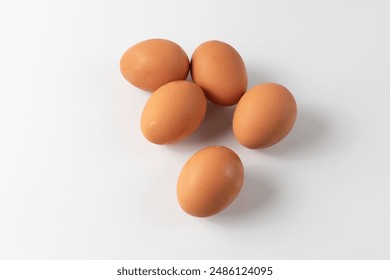 Fresh Chicken Eggs, close-up of eggs on white. - Powered by Shutterstock