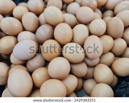 fresh chicken eggs displayed in the market. those eggs produced from local chicken farm