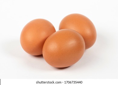 Fresh chicken eggs on white background - Shutterstock ID 1706735440
