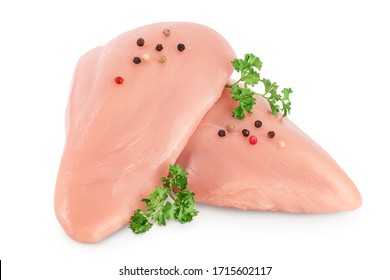 Fresh chicken fillet with parsley isolated on white background with clipping path and full depth of field.