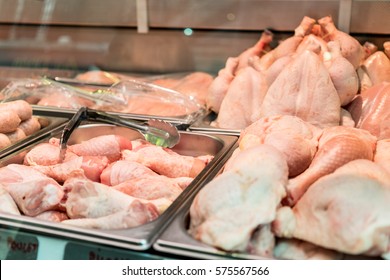 Fresh Chicken On Display In A Meat Market Counter