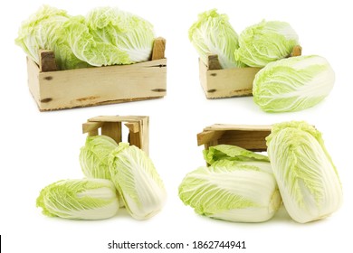 fresh chinese cabbage in a wooden crate on a white background