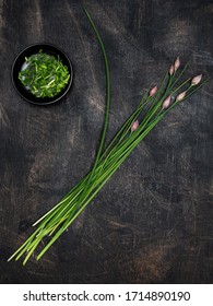 Fresh Chives And Chopped Ones On Dark Vintage Table. Overhead Shot With Copy Space.