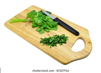 Fresh Chopped Coriander On A Wooden Board