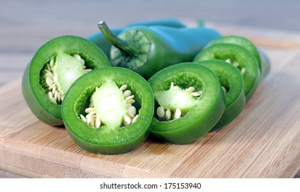 Fresh Chopped Jalapeno Pepper On Cutting Board