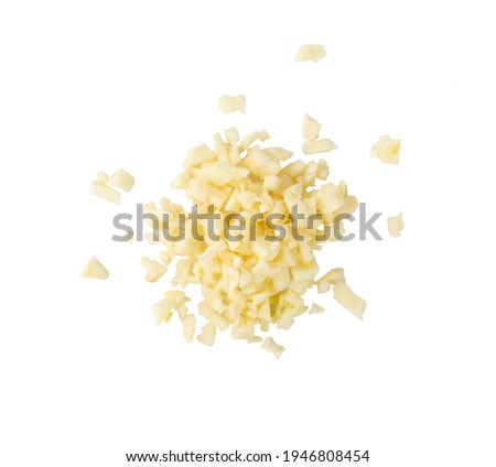 Fresh chopped minced garlic isolated on white background. Heap of crushed garlic cloves top view