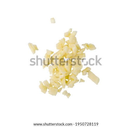 Fresh chopped minced garlic isolated on white background. Heap of crushed garlic cloves top view