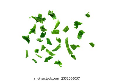 Fresh chopped parsley on a white background, top view. Chopped parsley leaves isolated on white background, top view. Chopped cilantro leaves, raw garden parsley.