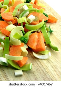 Fresh Chopped Vegetables On A Chopping Wooden Board