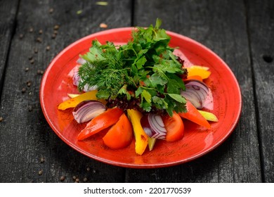 Fresh Chopped Vegetables In A Red Plate
