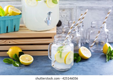 Fresh Citrus Lemonade With Lemons In Beverage Dispenser