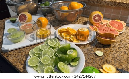 Fresh Citrus Oasis: Whole and Sliced Oranges, Grapefruits, and Lemons with Natural Juices