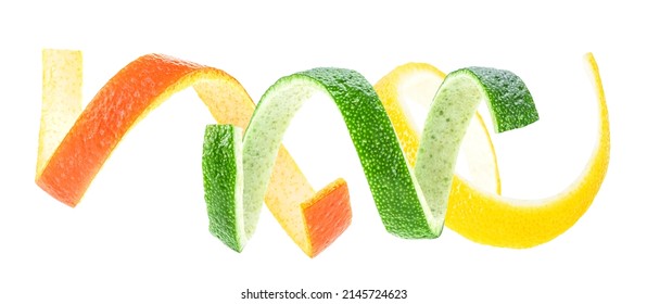 Fresh Citrus Peels Isolated On A White Background - Lemon, Lime And Orange Fruits. Citrus Zest Spirals.