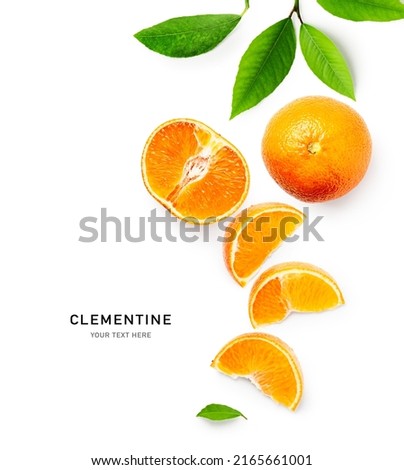 Fresh clementine fruit with leaves creative layout isolated on white background. Healthy eating and food concept. Tangerine or mandarin citrus fruits composition. Flat lay, top view
