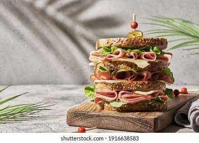 Fresh club sandwich with ham and cheese