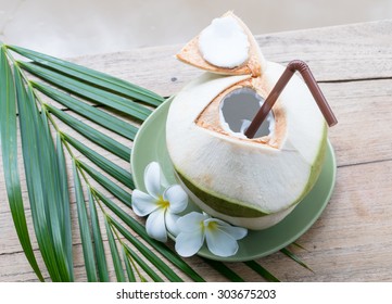 Fresh Coconut On A Wooden Table