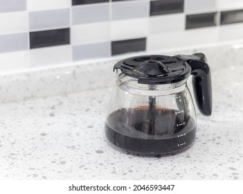 Fresh Coffee In A Filter Coffee Glass On A White Marble Kitchen Worktop