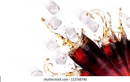 Fresh Coke Background With Ice And Splash Isolated On A White